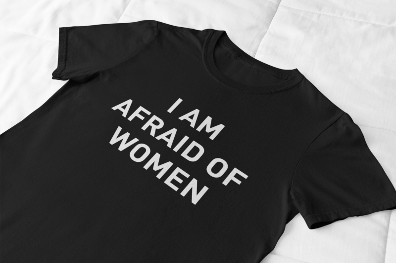 front-view-mockup-of-a-flat-lay-tee-against-a-soft-fabric-33942 (1).png