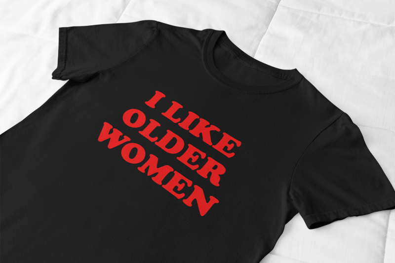 front-view-mockup-of-a-flat-lay-tee-against-a-soft-fabric-33942.png