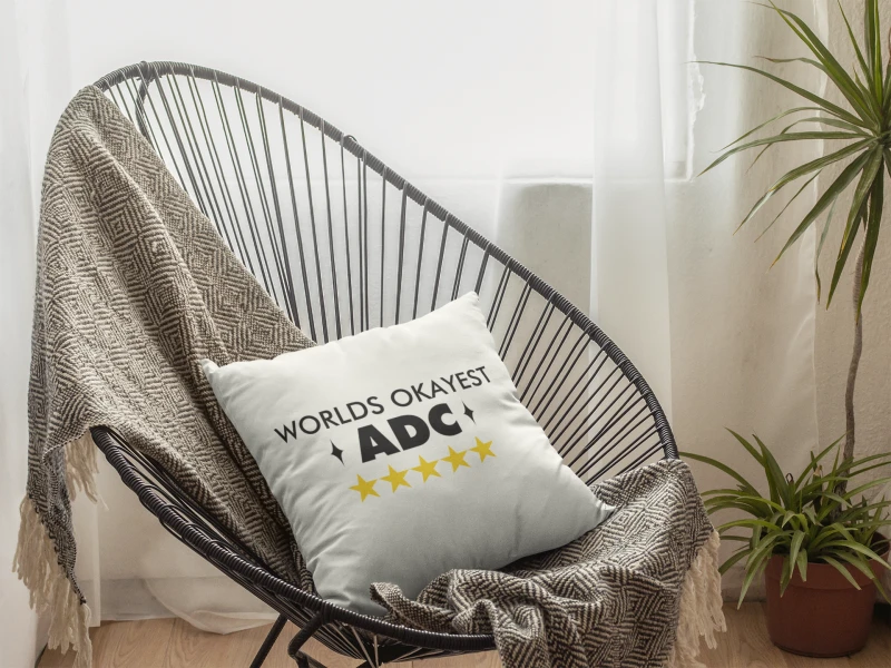 template-of-a-square-pillow-lying-on-an-acapulco-chair-indoors-a15176.png
