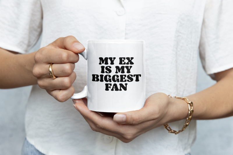 closeup-mockup-of-a-woman-holding-an-11-oz-coffee-mug-m35751.png