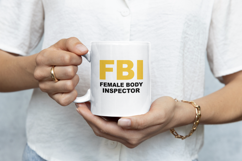 closeup-mockup-of-a-woman-holding-an-11-oz-coffee-mug-m35751.png