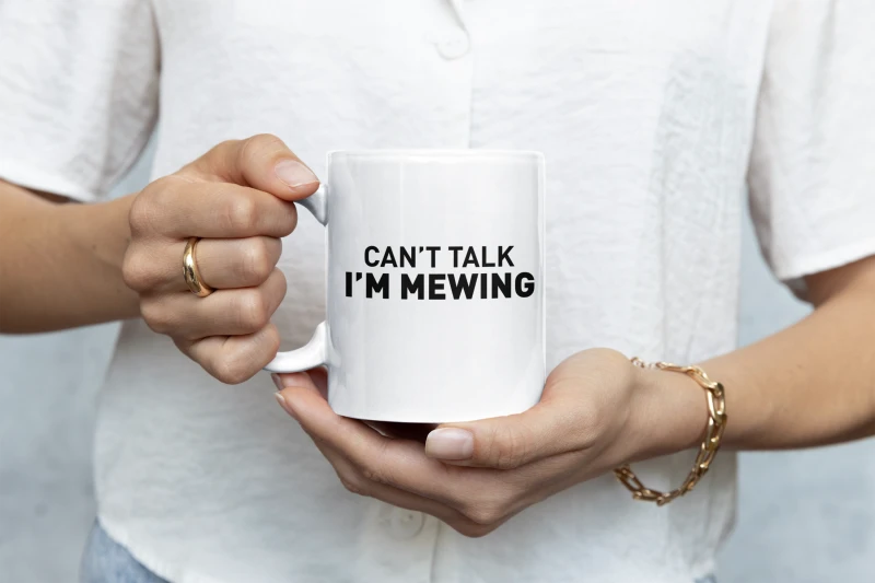 closeup-mockup-of-a-woman-holding-an-11-oz-coffee-mug-m35751 (1).png