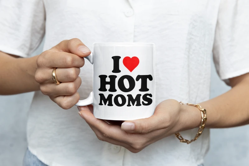 closeup-mockup-of-a-woman-holding-an-11-oz-coffee-mug-m35751.png