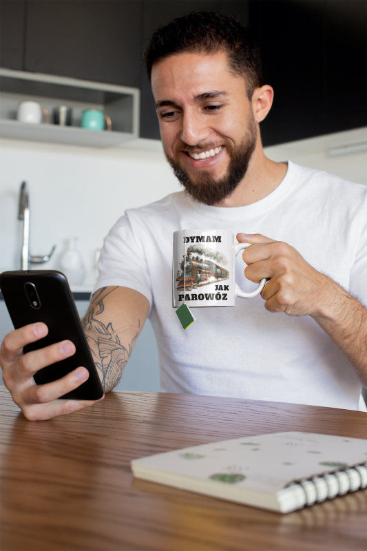 mug-mockup-of-a-tattooed-man-having-some-tea-at-home-24017 (1).png