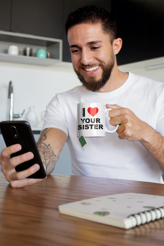 mug-mockup-of-a-tattooed-man-having-some-tea-at-home-24017.png