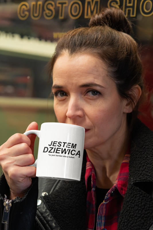 mockup-of-a-serious-woman-drinking-from-an-11-oz-mug-while-looking-at-the-camera-31793.png