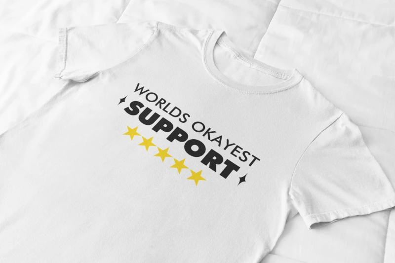 front-view-mockup-of-a-flat-lay-tee-against-a-soft-fabric-33942 (3).png